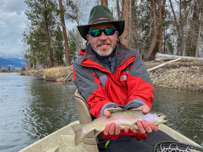 Mike with a pair of nice rainbows out of the same eddy