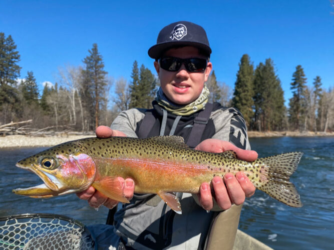 Thomas with a stud rainbow in a back eddy