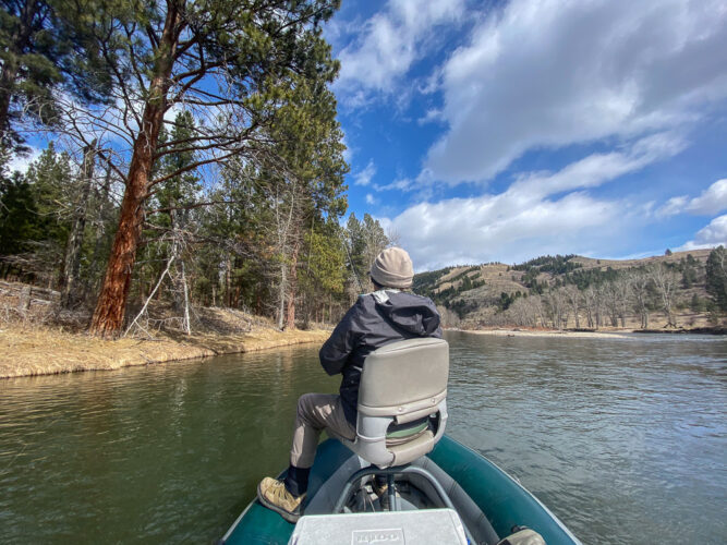 Nancy tight to a nice cutthroat on a dry fly 