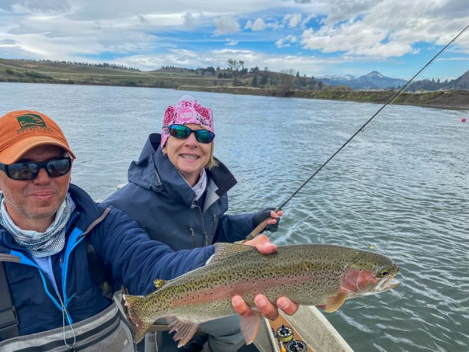 Sheila with a healthy big rainbow trout