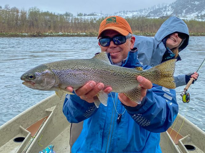 Jason with a nice rainbow in the morning - Wild Weather Trout Fishing the Missouri