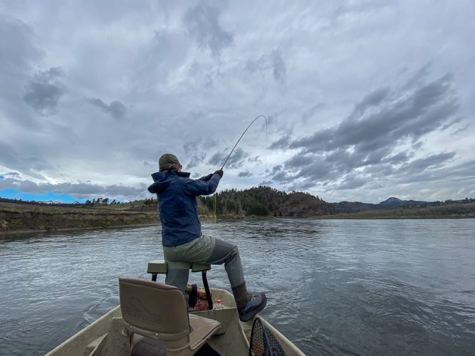 Sheila holding court on the Mo - Big Rainbow Trout