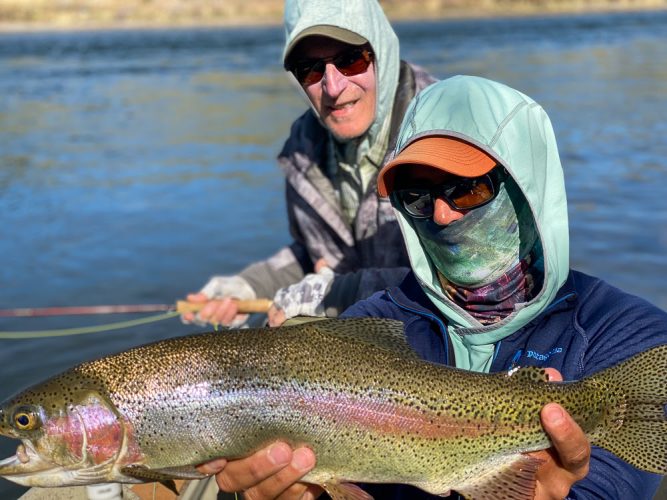 Jim with one too big for the frame early - Wild Weather Trout Fishing