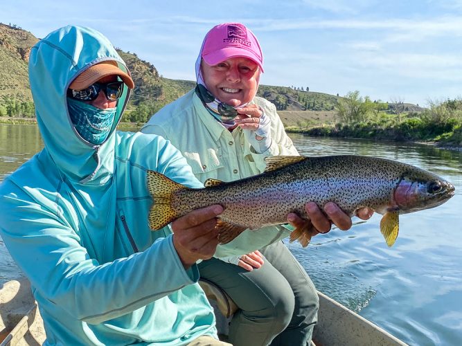 Dianne with a big Missouri River rainbow trout that jumped 5 or 6 times