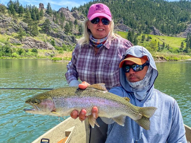 Dianne with a fat Missouri River Rainbow Trout in the canyon