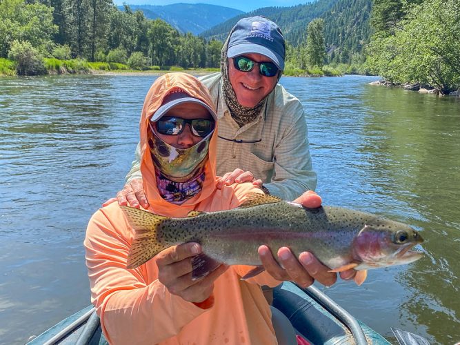 Bill with a healthy rainbow on the dry fly - Missoula Trout Fishing