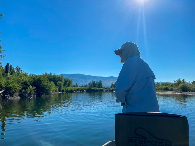Bob hooked up to a solid pike - Clark Fork Fly Fishing July