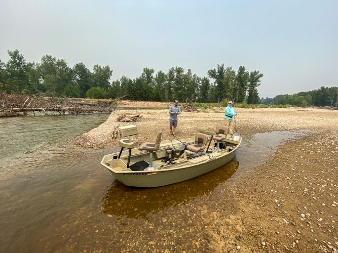 Preparing to drag the boat over the gravel bar - Mid-July Missoula Fishing