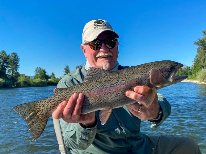 Bob with a slab rainbow from a sneaky spot on the Clark Fork Fly Fishing in July