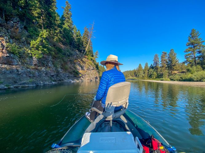 Linda working a rock wall in the morning - Late Summer Missoula Fishing