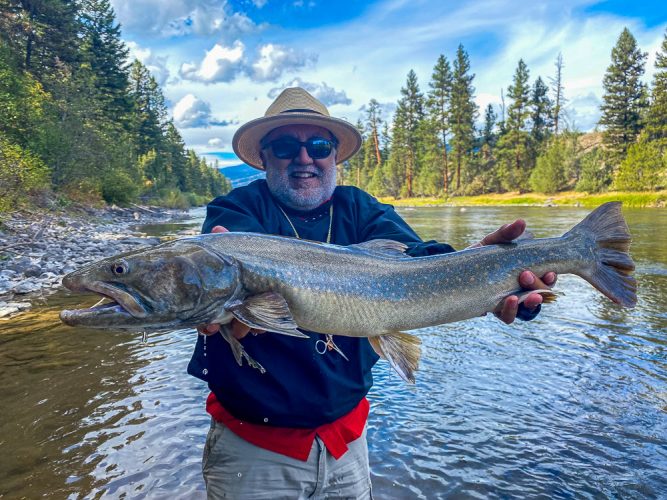 Marcelo with a spectacular bull trout - Missoula Fall Fishing