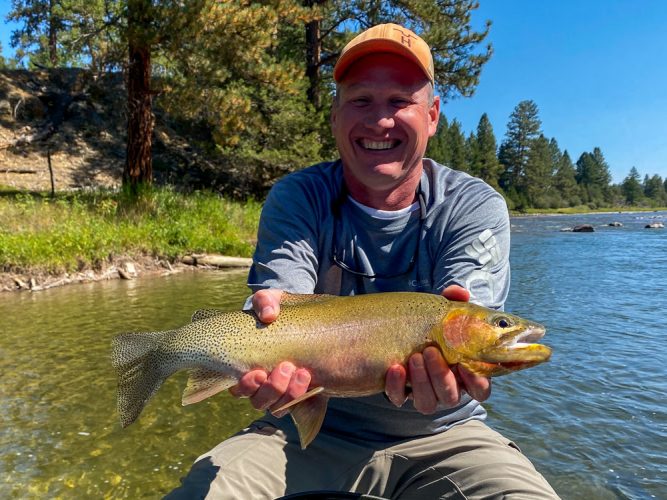 Tommy with a super thick cutthroat on a dropper - Late Summer Missoula Fishing