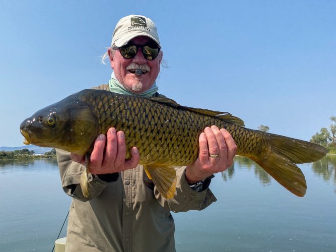 Bob was all smiles with a dry fly carp - Clarkfork August Fishing