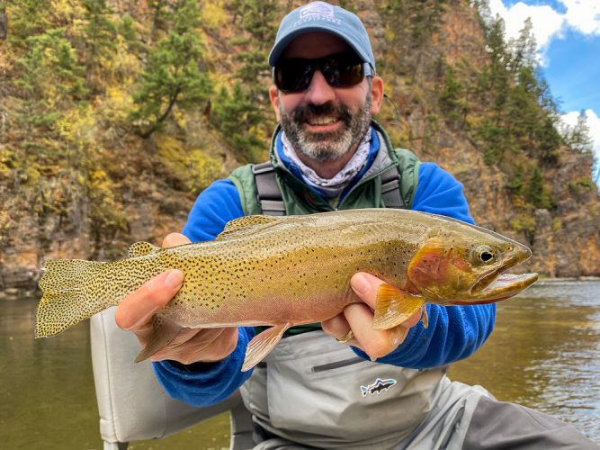 Gregg with an awesome fish on a small dry fly - Montana Fall Fishing Fun
