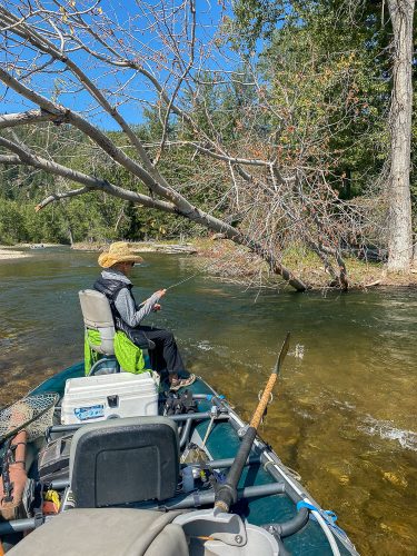 Martha up to her usual tricks. Hooking fish while I walk through boat through logjams - Late Summer Missoula Fishing