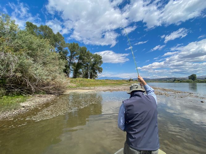 Mark with a hot fish he pulled out of foam pocket - Montana Fly Fishing