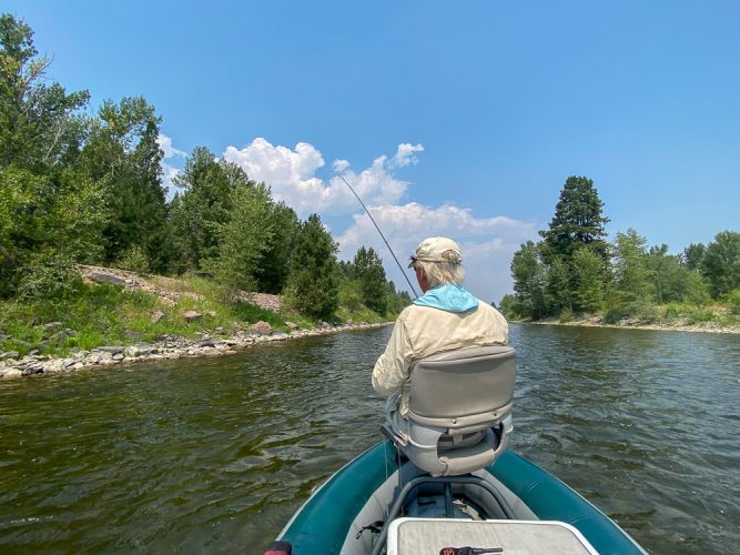 Herb hooked up on the small black ant - Blackfoot River Early Morning Fishing