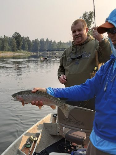 Nice dry fly rainbow for Buck - July Missoula Fishing Trips