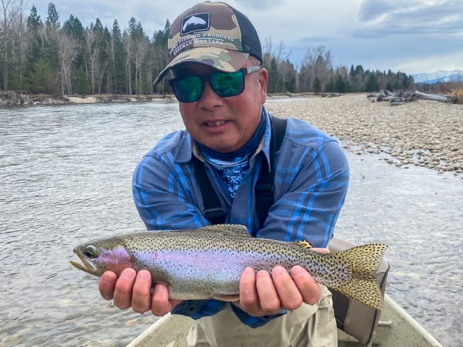 Daren with one of several nice rainbows in the afternoon - Spring Fishing Montana 2022