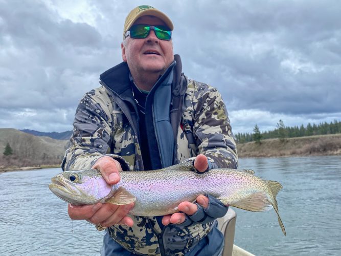 John with a bright rainbow- Flyfishing Montana 2022