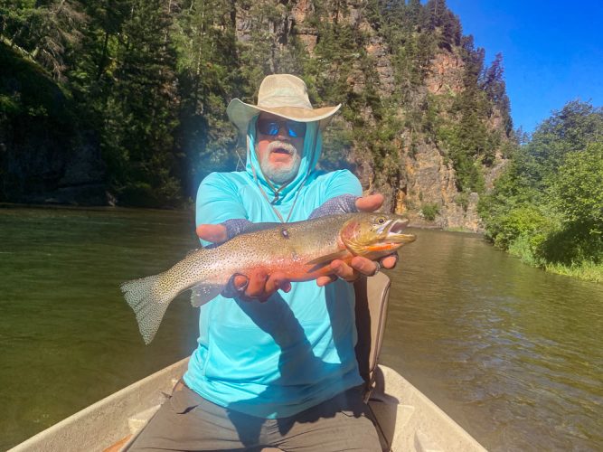 Chris with a solid cutthroat - Missoula Fishing 2022