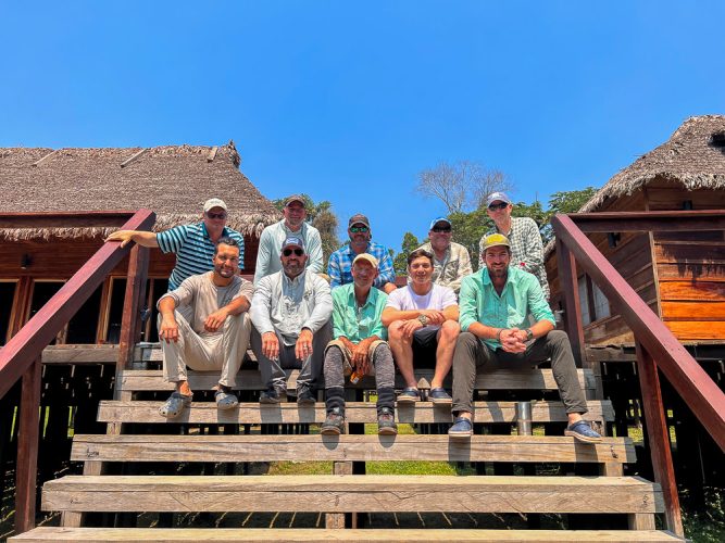 Guides and anglers on the steps of the Secure River lodge - Bolivia Golden Dorado Fishing