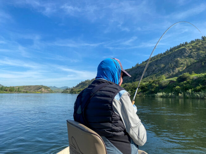 Bob with big bend in the rod above Wolf Creek - Missouri River Trout Fishing