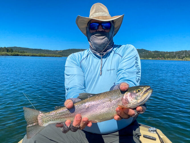 Chris with a solid Georgetown rainbow - Hoot Owl Trout Fishing