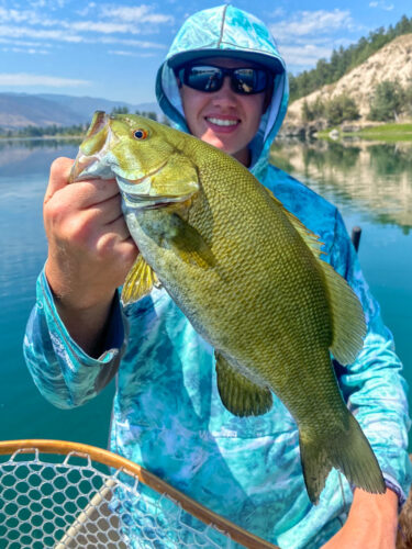 Thomas with the bass of the day - Spruce Moth Hatch Fishing