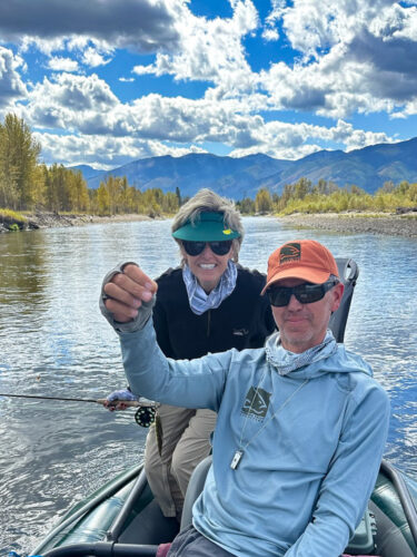 Had to get a photo with Cindi and what may be the smallest trout of the year - September Montana Fishing report