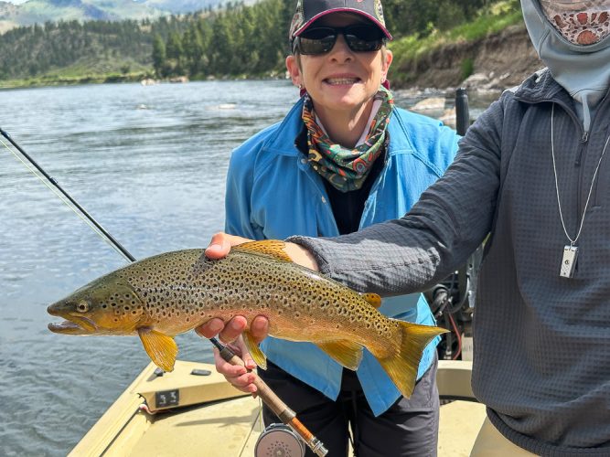 Sheila was all smiles with the big trout at LOG - Missoula Fishing Report 2024