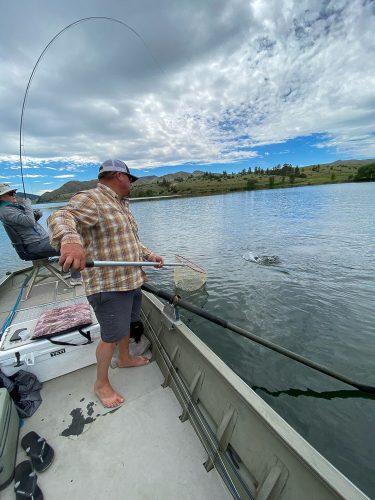 Guide Scott at the ready as Laura brings one close - Missoula Fishing Report 2024