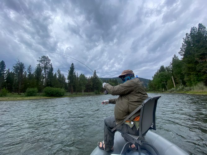 Tyler bundled up and hooked up in the morning - Missoula Fishing Report 2024