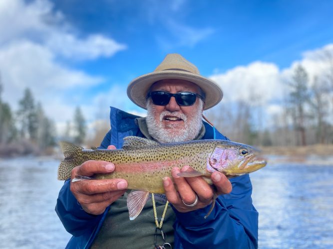 Marcelo with a pretty rainbow - Catching the Big One's in Montana