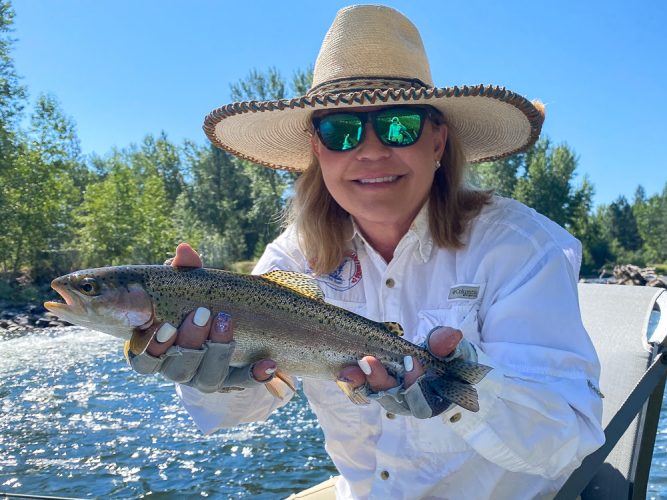 Sandra with a nice rainbow - Bitterroot Trout Fishing Guide