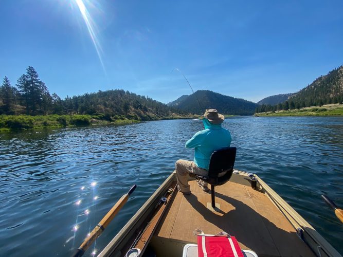 Chris hooked up to a hot rainbow - Montana Trout Fishing July Report