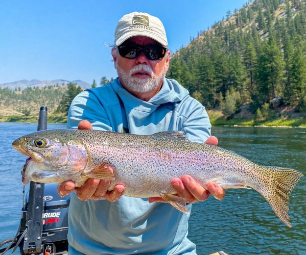 22" bruiser on a dry fly...not sure how she eats with that deformed mouth but based on girth she is doing fine - Montana Trout Fishing July Report
