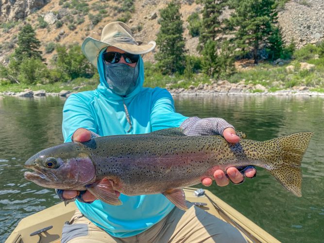 Chris with a 23" slab late in the day - Montana Trout Fishing July Report