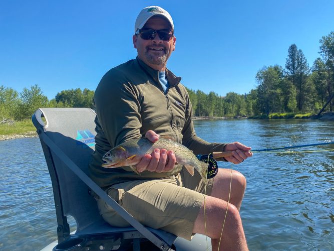 Chris with a nice dry fly cutthroat - Bitterroot Trout Fishing Guide