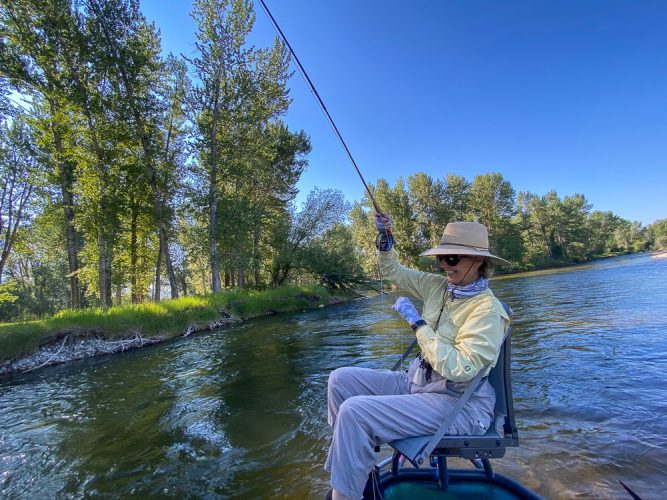 Cindi hooked up in the morning - Bitterroot Trout Fishing Guide