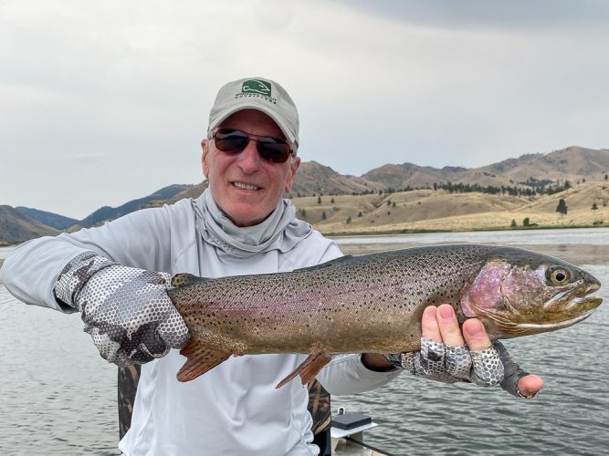 Jim was all smiles with a 23" bow to finish off the trip - August Fishing