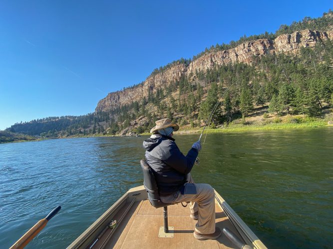 Chris spent a lot the day with a big bend in his rod - Fall Fishing the Land of the Giants