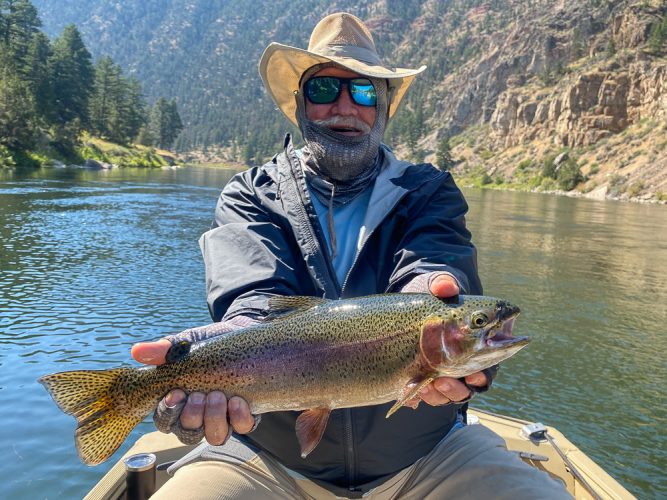 Chris couldn't help but smile with the size of fish today - Fall Fishing the Land of the Giants