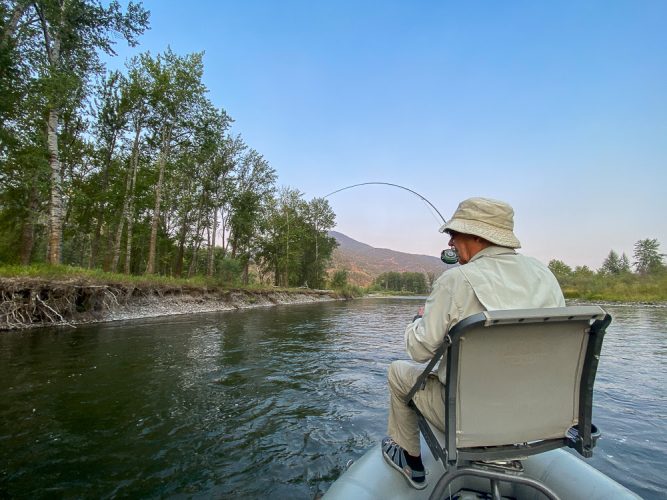 Warren tight to a hot rainbow - Fall Fishing the Land of the Giants