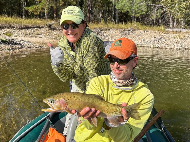 Nancy with big fish of the day in the morning, and also 1st place for best coordinated outfit with the guide for 2024 - Missoula Fall Fishing