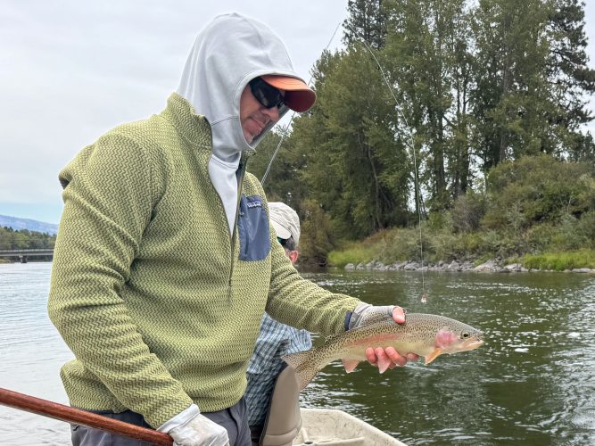 Last cast and last fish of the day with the bridge in sight - Fall Fishing in Montana